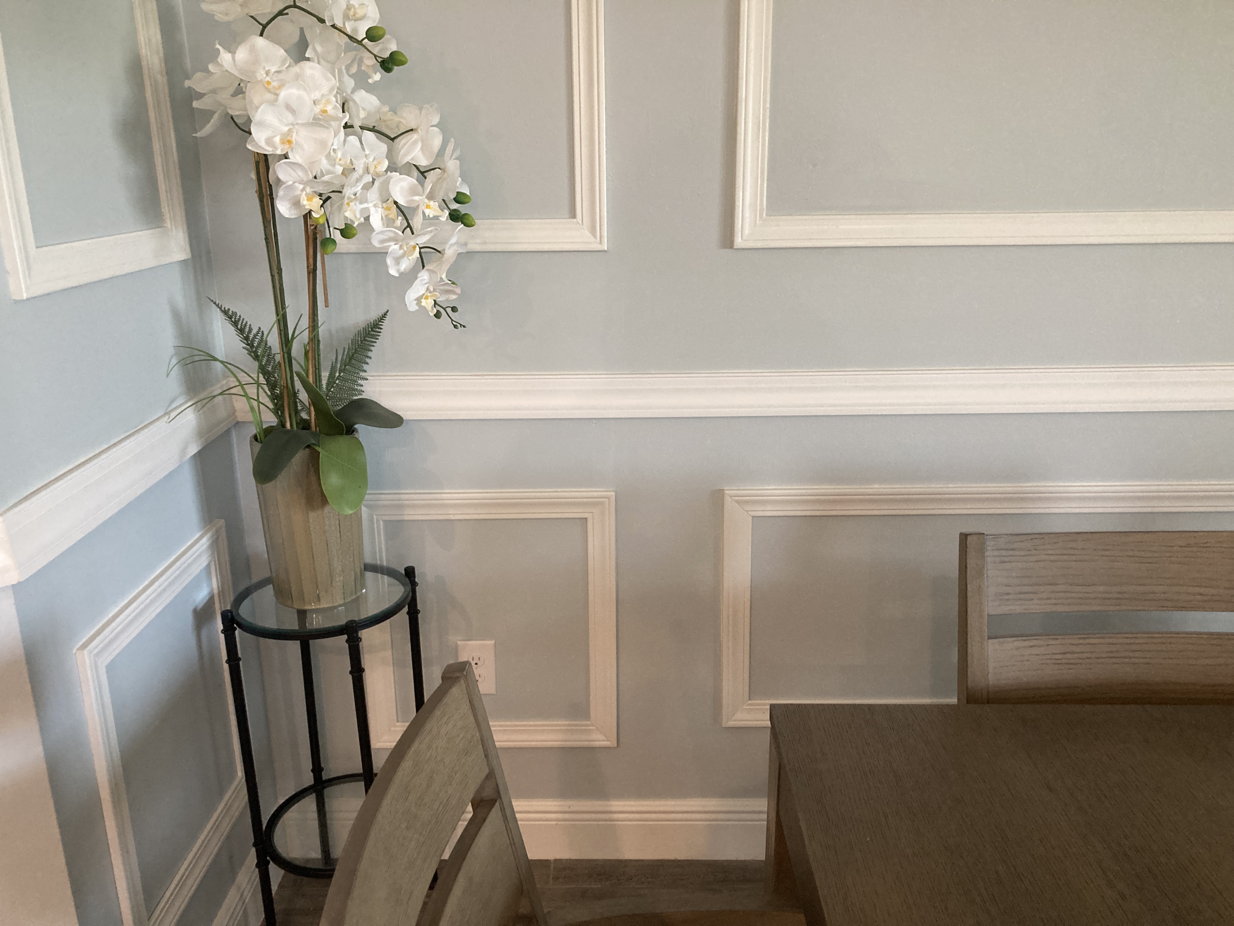 Wainscoting detail showing corner molding and chair rail