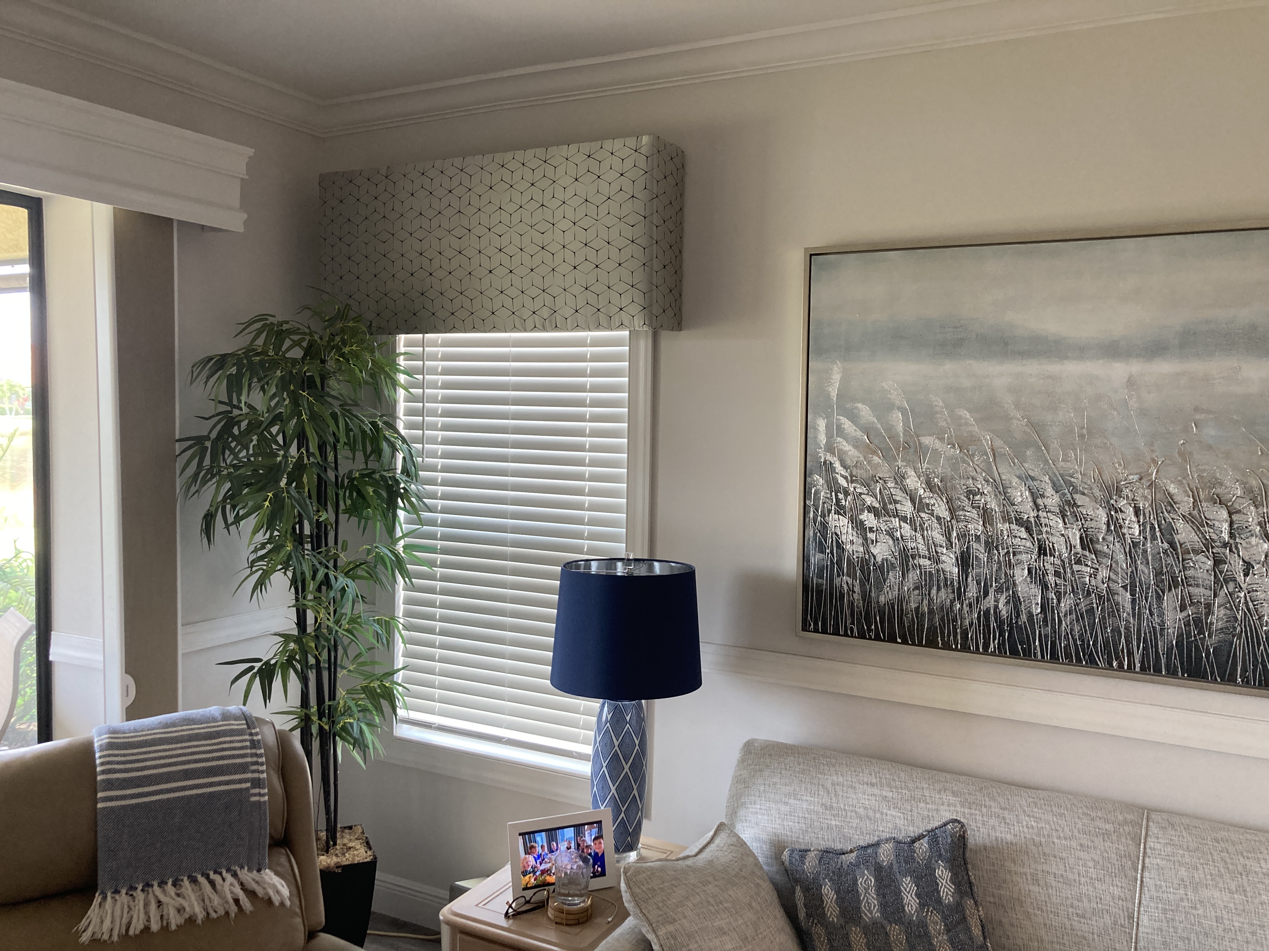 Dining room with picture frame wainscoting and fresh paint